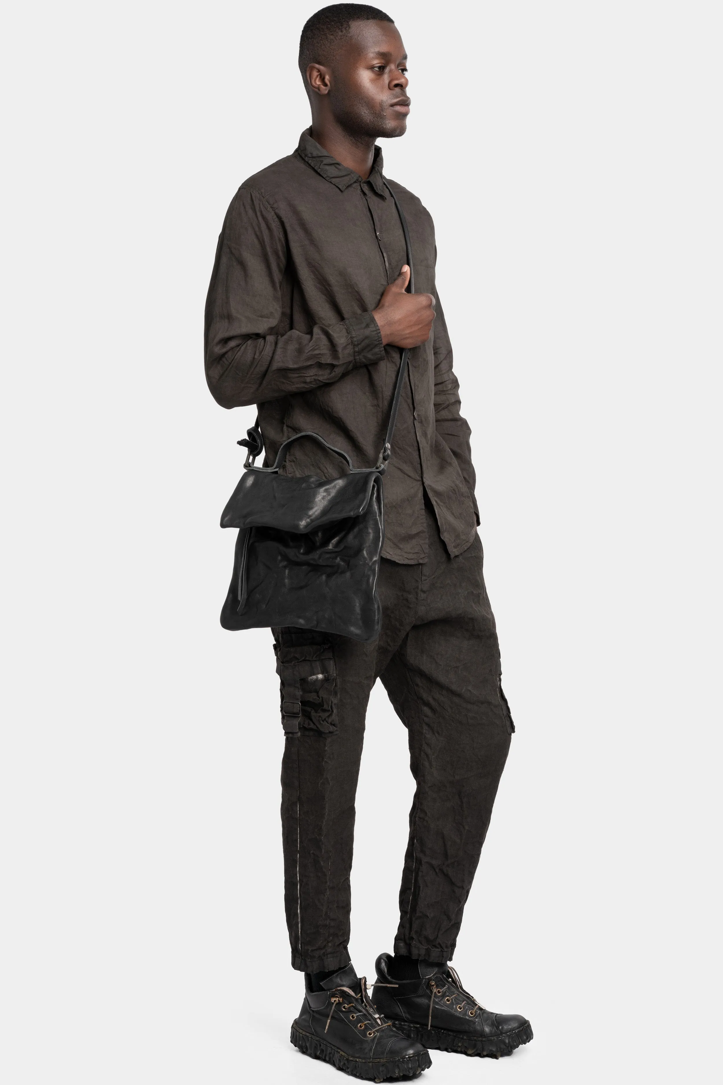 Folded messenger leather bag