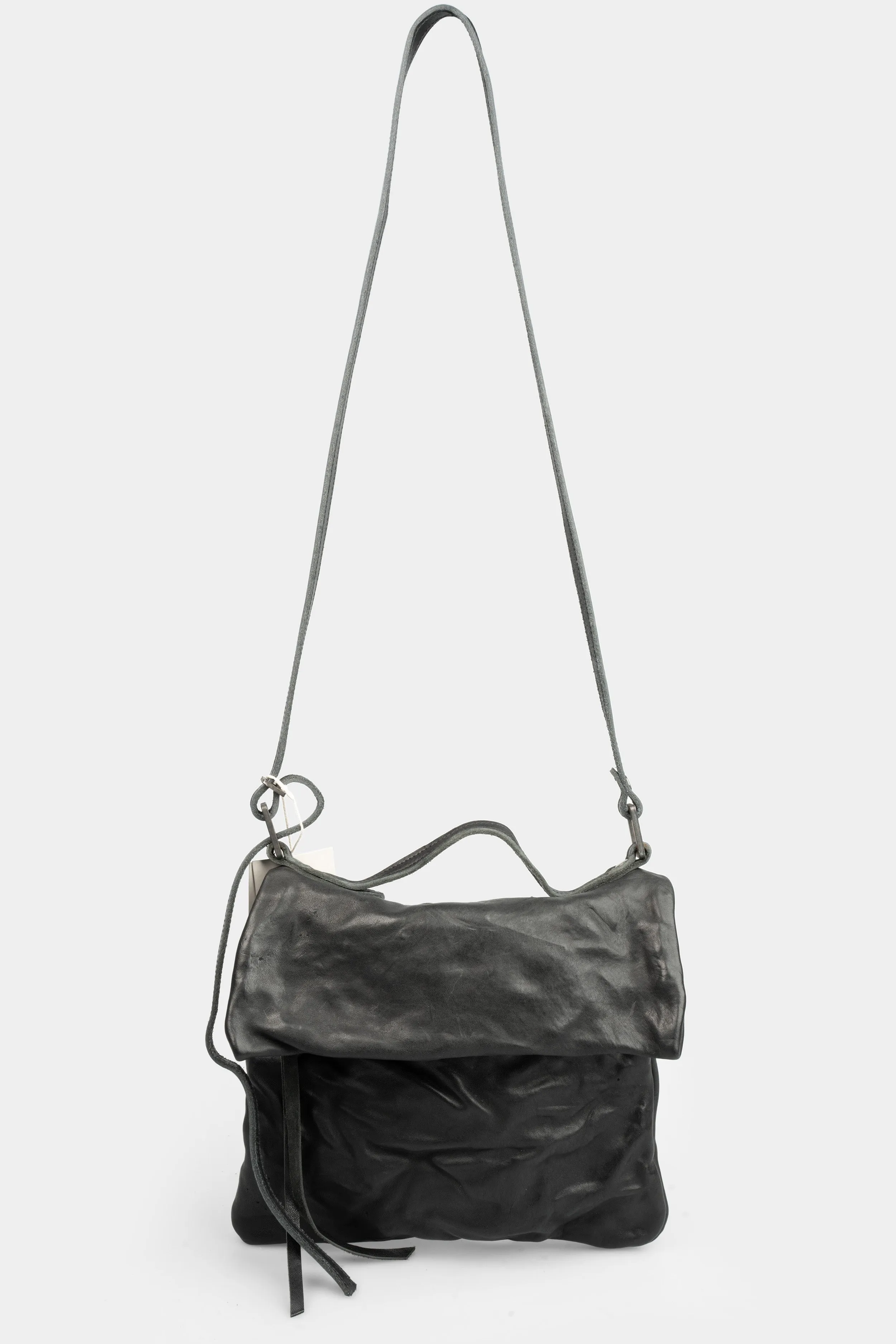 Folded messenger leather bag