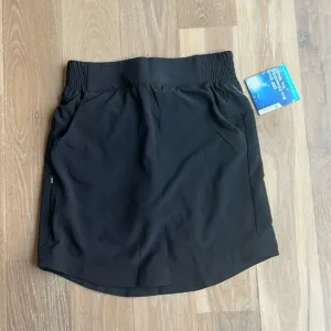 NWT Coolibar Pisa Skort in black. Longer length. Stretch. UPF 50 