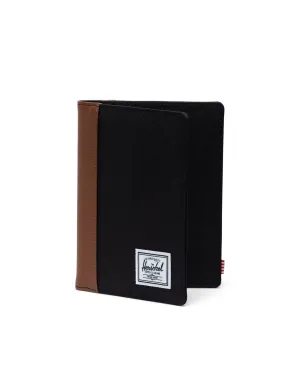 RAYNOR PASSPORT HOLDER (BLACK/TAN) - HERSCHEL