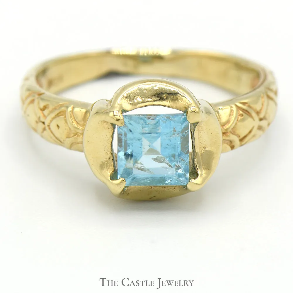 Square Shaped Blue Topaz Ring in 14k Yellow Gold Concave Mounting with Ornate Sides